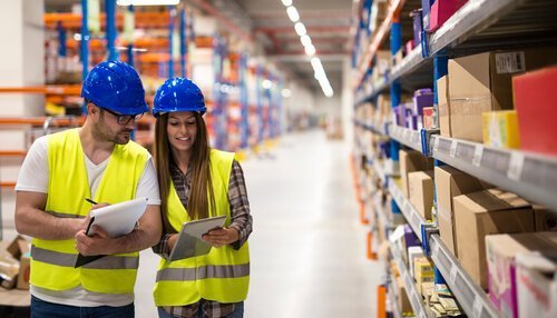 Warehouse workers doing end of year inventory counts