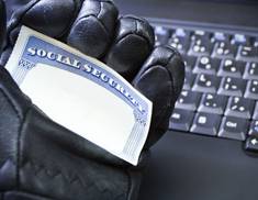 identity thief's gloved hand