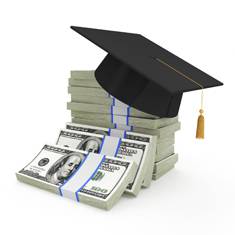 graduation cap on money
