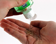 Hands with hand sanitizer 
