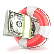 Stack of $100 dollar bills sitting in a life raft 